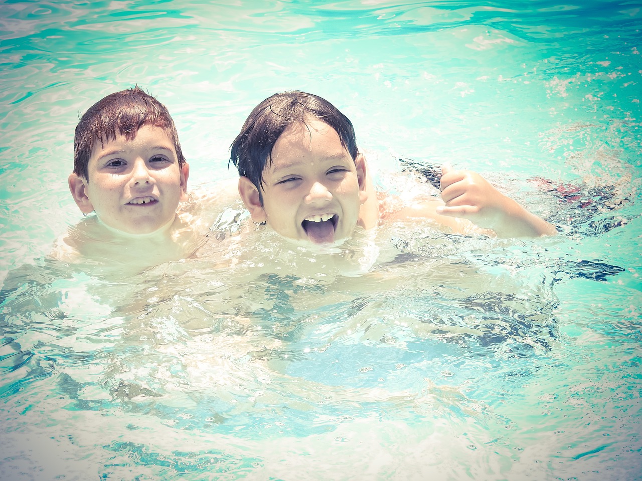Children meeting new friends using Holiday Friend Finder app before arrival